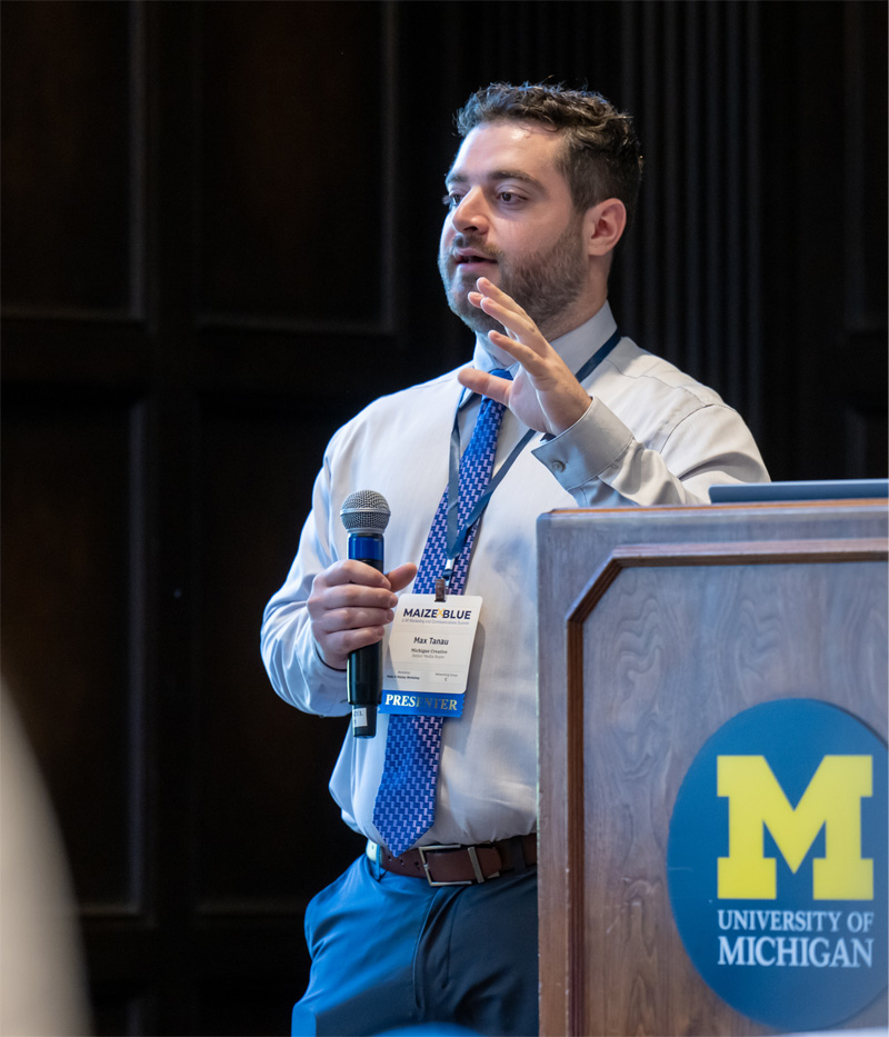 Michigan Creative employee Max Tanau presents at MXB.