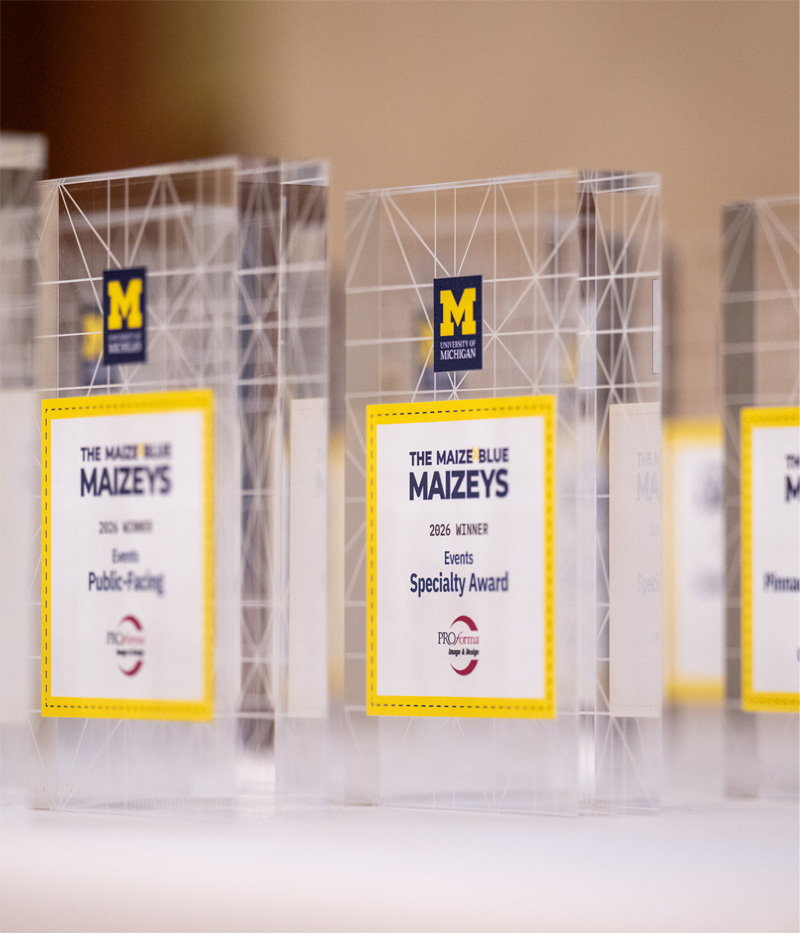 A side view of several glass Maizey awards.