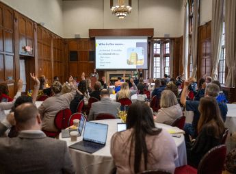 A conference session presentation at the Michigan League