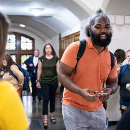 Past conference participants walking through the Michigan Union hallways