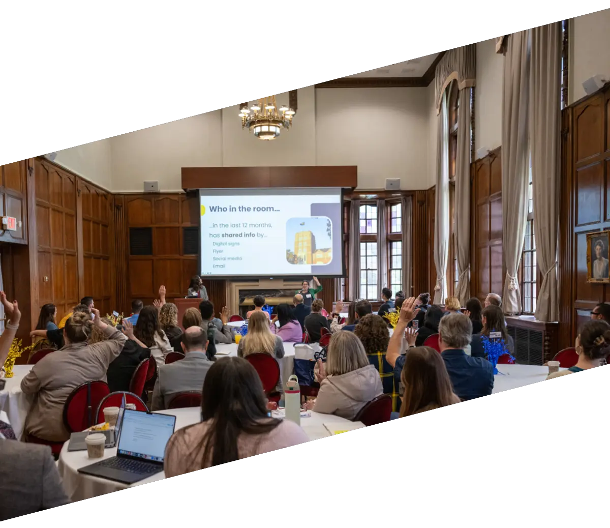 People attending a conference talk